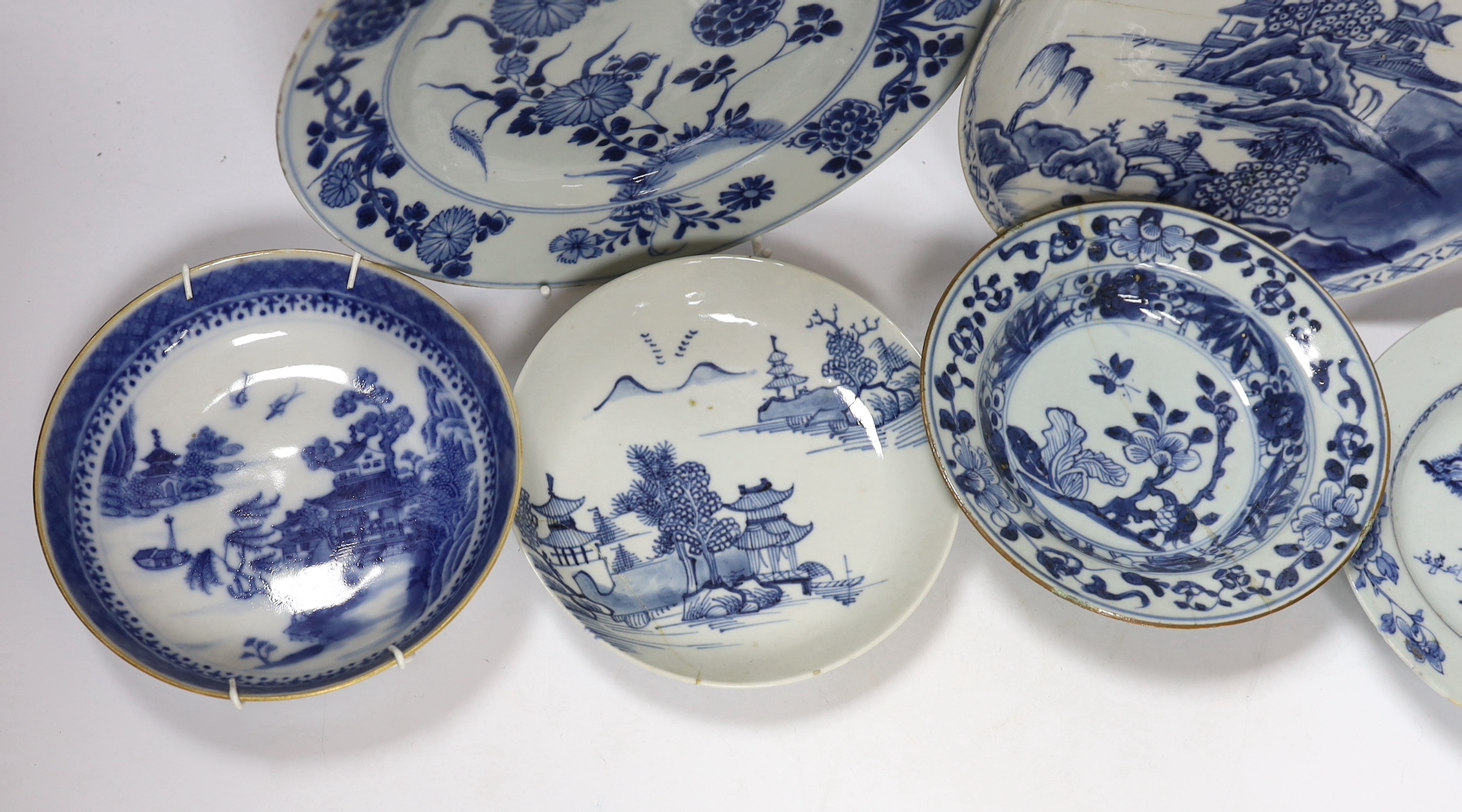 Six Chinese Export blue and white wall plates/dishes, 18th century and later, largest 22cm